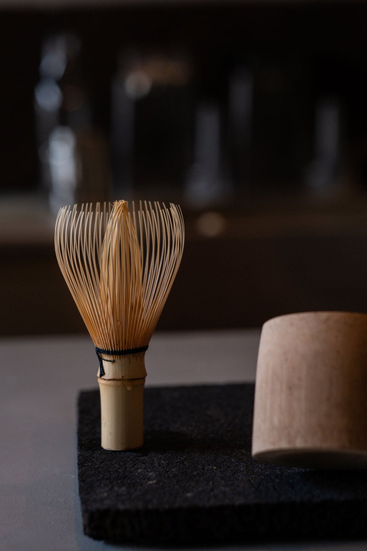 A traditional bamboo chasen, the whisk used to prepare matcha.