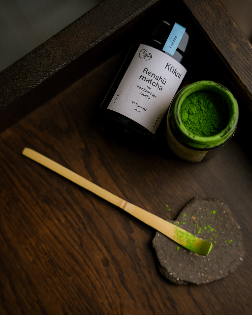 Renshū matcha flatlay with tools and jar